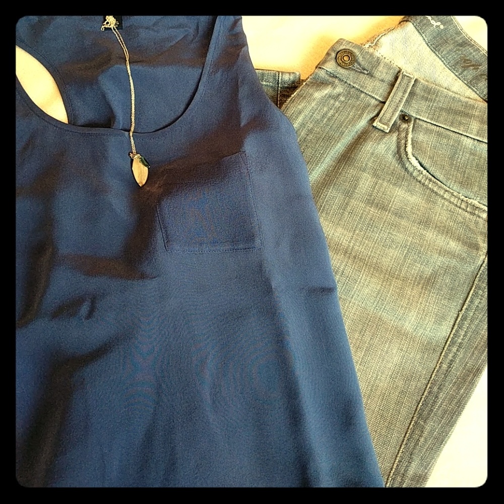100% silk tank top! Beautiful color! Never worn